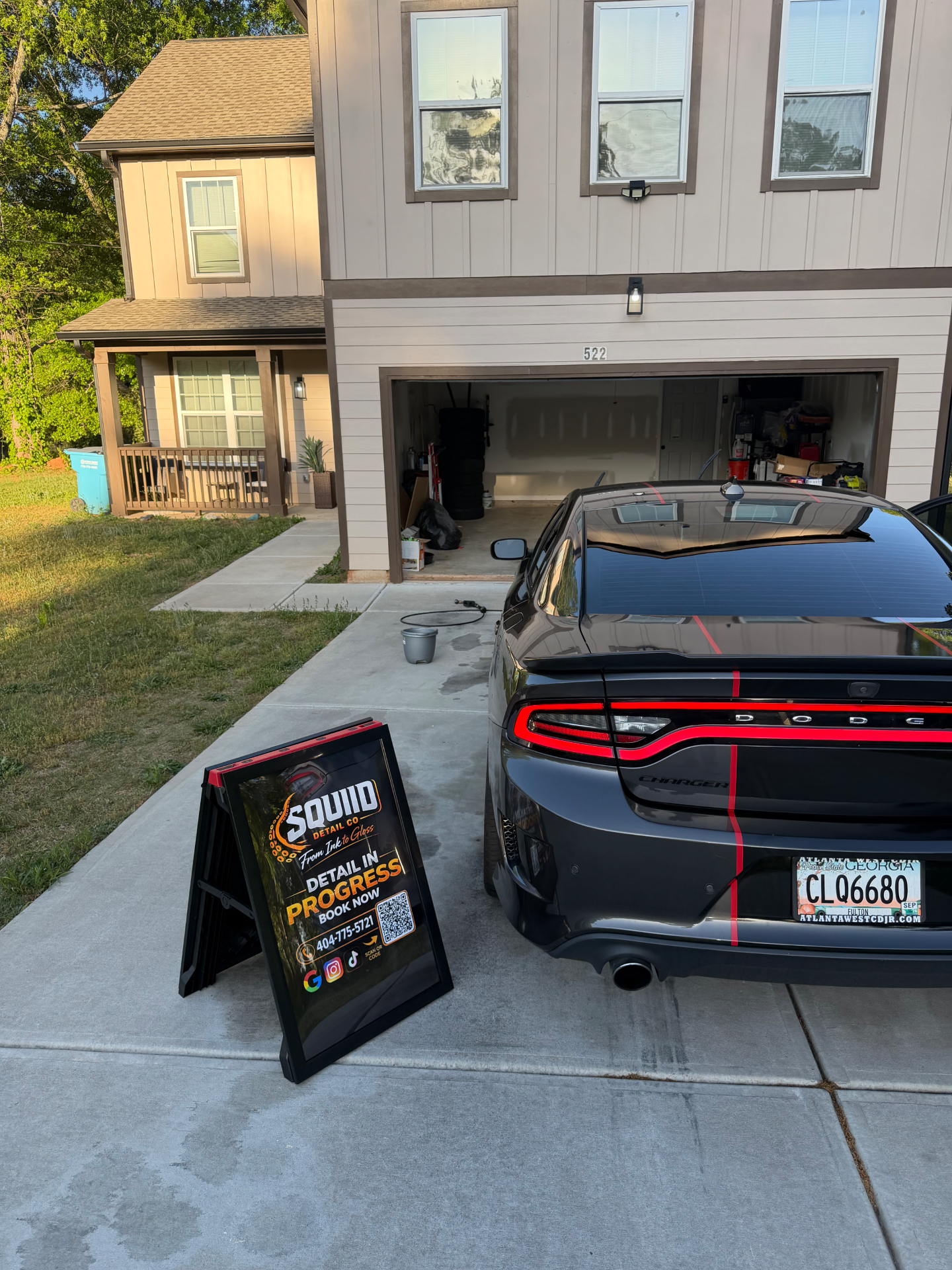Charger Scat Pack with Squiid Detail Co A-frame sign